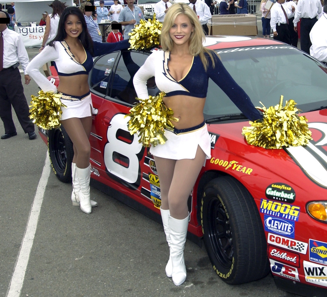 Two Cheerleaders wearing White Sheer Pantyhose, Boots and White Microskirts